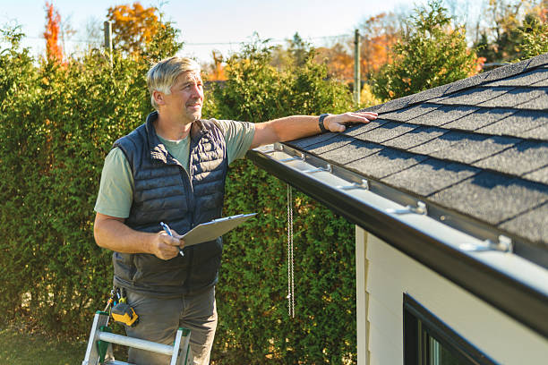 Professional Storm Damage Roof Repair technician working in Chelsea, MA
